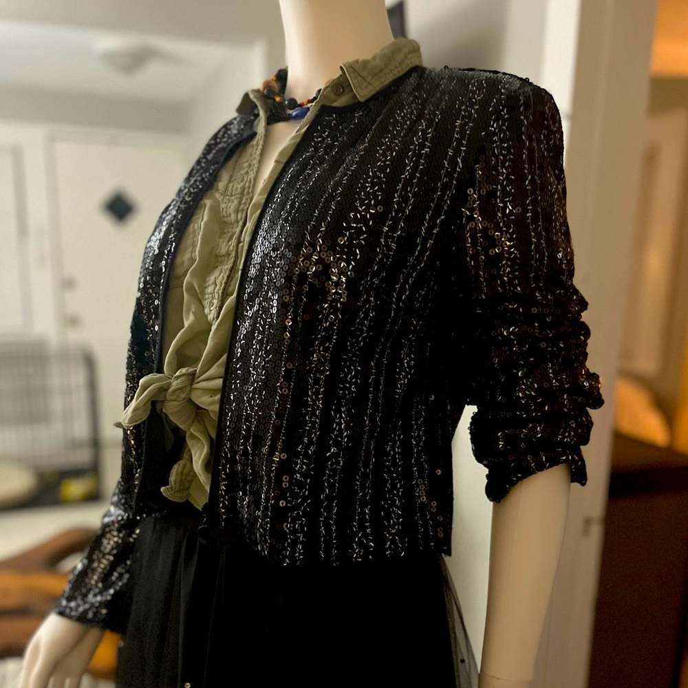 Sparkly black and silver sequined jacket by Christian Siriano